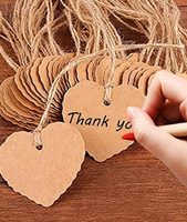 Tuotelappuja narulla ruskea sydän+manilla naru 20m. 100 kpl