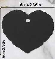 Tuotelappuja narulla musta sydän+manilla naru 20m. 100 kpl