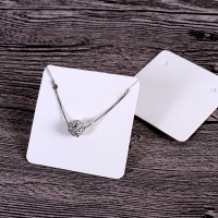 Korujen tuote ripustinlappu 100 kpl 