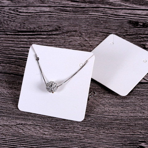 Korujen tuote ripustinlappu 100 kpl 