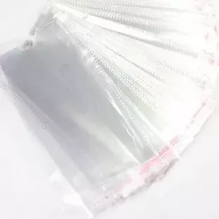 Pakkauspussi avonaisella pääty reijällä 12x27cm 200kpl