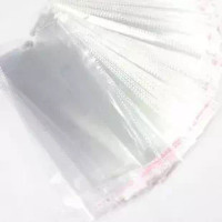 Pakkauspussi avonaisella pääty reijällä 12x27cm 200kpl