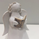 KERAAMINEN ENKELI RASIASSA, 5 eri hahmoa&tekstiä