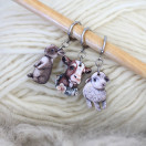 SILMUKKAMERKKI- / RENGASKORVAKORU-SETTI, KAIHO-VASIKKA JA KAMUT