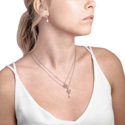 Lumoava Helmi keltakulta korvakoru L74194144000