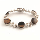 Kultateollisuus oy | Jorma Laine | Tiikerinsilmä Rannekoru |  Hopeaa -72