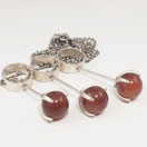 Kupittaan Kulta |  Elis Kauppi  | Riipus | 3x karneoli |  Hopeaa -65