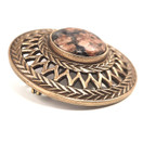 Kalevala koru |Uskelan solki |  Graniitti | Rintakoru Pronssia