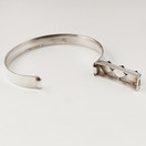 Koruvalmistamo Martti Viikinniemi | Rannekoru punaisilla kivillä | Hopeaa -63