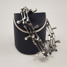 Kultateollisuus oy | Jorma Laine | Rannekoru | 830 Hopeaa -74