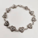 KK | Kalevala Koru | Talon sydän käätykoru | Rannekoru | Hopeaa