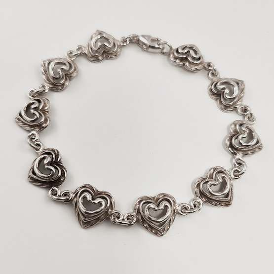 KK | Kalevala Koru | Talon sydän käätykoru | Rannekoru | Hopeaa