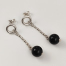 KK, Kalevala Koru | Mari Saari | Pore Korvakorut | onyx kivet | Hopeaa