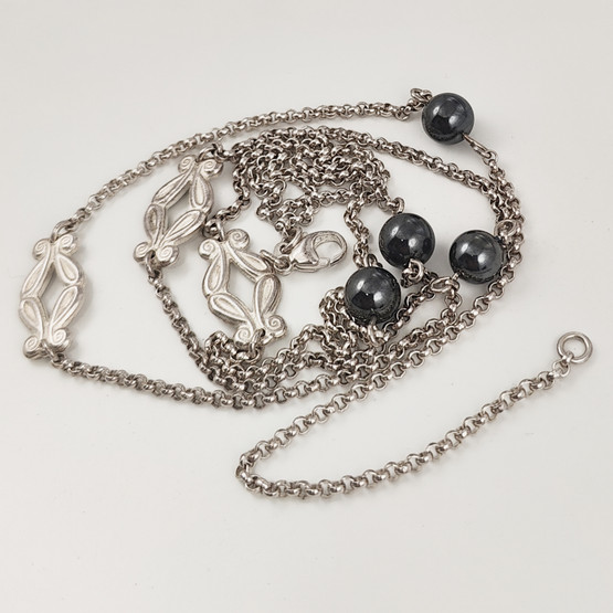 Kalevala koru | Mari Saari | IRIS -kääty | Kaulakoru |  Hopeaa