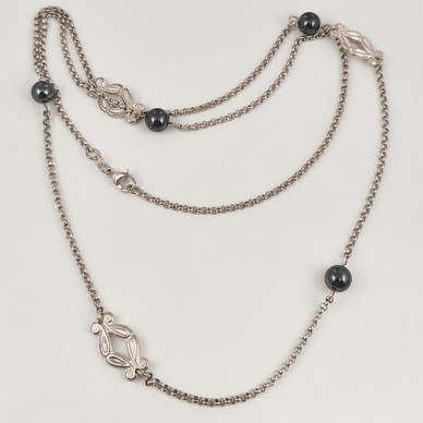 Kalevala koru | Mari Saari | IRIS -kääty | Kaulakoru |  Hopeaa