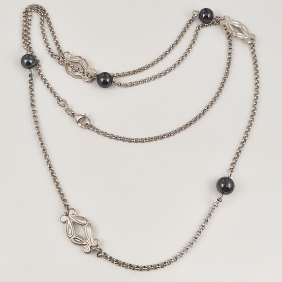 Kalevala koru | Mari Saari | IRIS -kääty | Kaulakoru |  Hopeaa