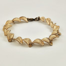 Kalevala Koru | Lumikukka Rannekoru | | Pronssia