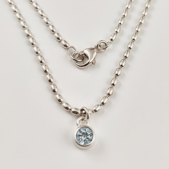 Kalevala Koru | Lähde kaulakoru | Sininen Topaasi | Hopeaa