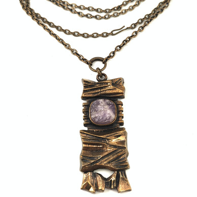 Turun Hopea oy | Pentti Sarpeneva | Kelo -Riipus | Ametisti kaulakoru |  Pronssia