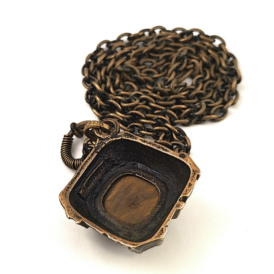 Turun Hopea oy | Pentti Sarpaneva | ´Kelo´ -Pendant | Tiger eye- necklace |  Bronze