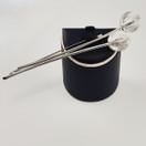 Kalevala Koru | LUMIKUKKA solki | Rintakoru | Hopeaa