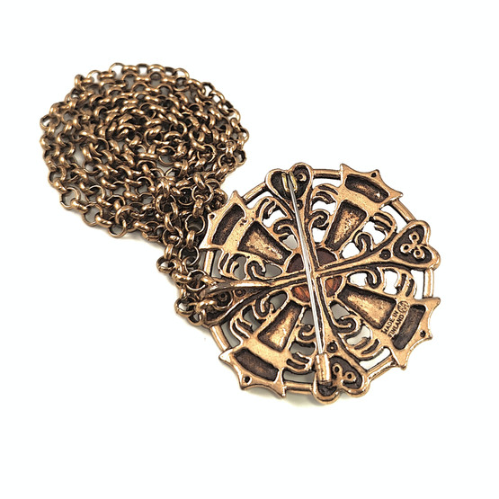 Kalevala Koru |  Kuukiven Riipus / Solki | Meripihka | Kaulakoru | Pronssia