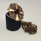 Kalevala Koru |  Kuukiven Riipus / Solki | Meripihka | Kaulakoru | Pronssia