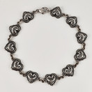 KK | Kalevala Koru | Talon sydän käätykoru | Rannekoru | Hopeaa