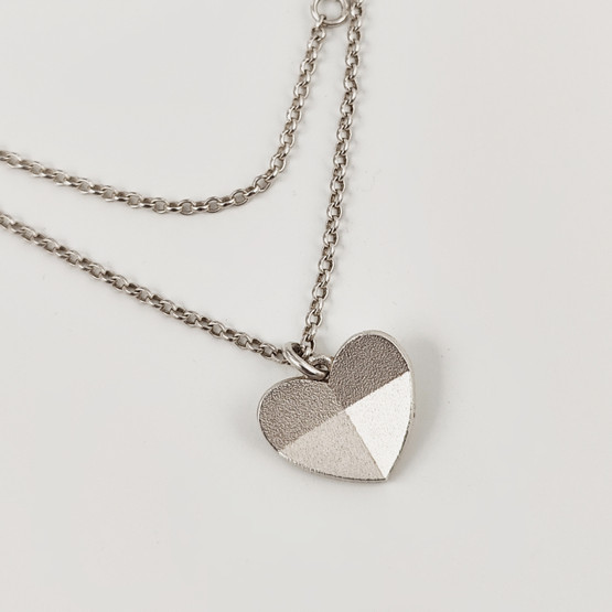 Kalevala Koru  | KOHDATAAN -Riipus | Kaulakoru | Hopeaa