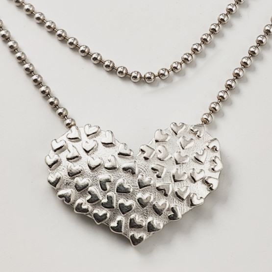 Kalevala Koru | TÄYSIN SYDÄMIN -riipus |  kaulakoru | Hopeaa