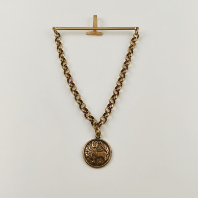 Kalevala Koru | Aurinkoleijona solmioneula | Pronssia