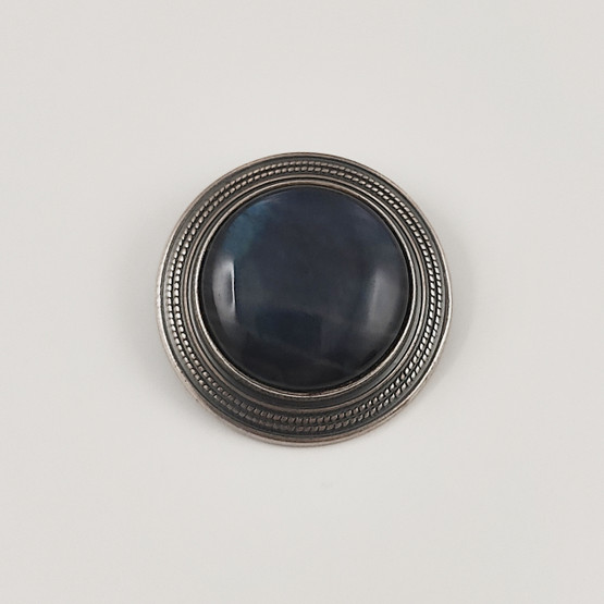 Kalevala Koru | SOLKI -1643 | Rintakoru |  Spektroliitti  | Hopeaa