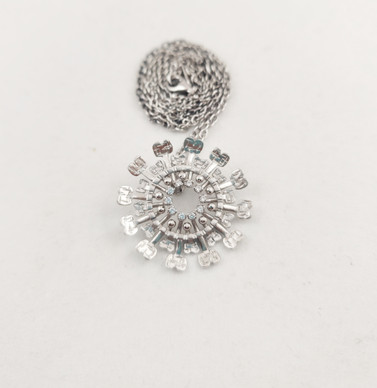 Tapio Wirkkala,  'Sun' pendant , Sterling