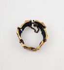 Valo-koru / Hannu Ikonen, näyttävä  Rannekoru , Pronssia