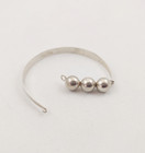 Valo-koru rannerengas Hopeaa -69