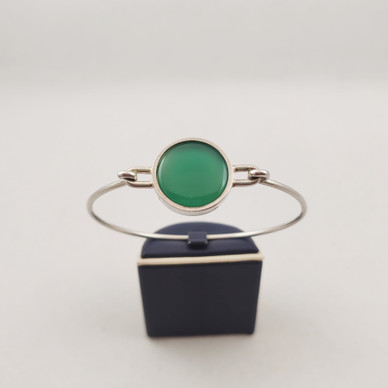 Elis Kauppi , akaatti Rannekoru Hopeaa -76