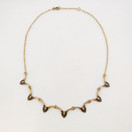 Kalevala Koru, Helinä kääty, Pronssia