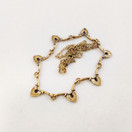 Kalevala Koru, Helinä kääty, Pronssia