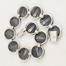 Hermann Siersbol, Tanska. ´Simpukka´ rannekoru , Hopeaa