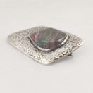 Kultasepänliike Reinikka & Laine, Käsityö , Rintakoru kivellä, Hopeaa -66