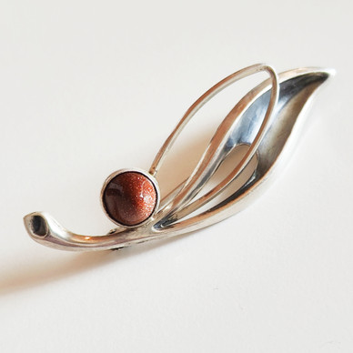 E.Granit & co. , Brooch , stream of gold-stone , Silver