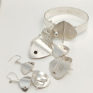 Kultasepät Salovaara, Kaarina. Design Pia Kauppi, Korusetti, Hopeaa