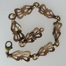 Kalevala Koru, Aurinkoleijona rannekoru, Pronssia