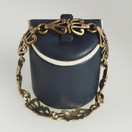 Kalevala Koru, Aurinkoleijona rannekoru, Pronssia