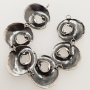 NW / Helky Juvonen , Suivakko , Outa -sarjan Rannekoru , Hopeaa -72 