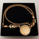 Kalevala Koru, Aurinkoleijona kääty, kaulakoru 18k kultaa , -97