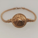 Kalevala Koru, Aurinkoleijona Rannekoru, Amuletti,  18k kultaa 