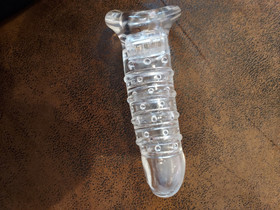 Kiihotuskumi nystyillä ja juomulla, sleevessä mukana vibraattori