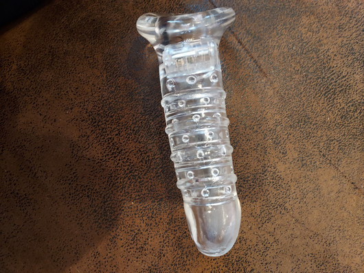 Kiihotuskumi nystyillä ja juomulla, sleevessä mukana vibraattori