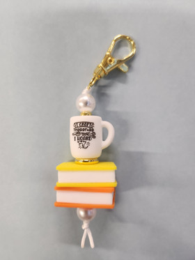 Avaimenperä kirja, kultaklipsi